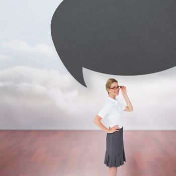 Thinking businesswoman with speech bubble against clouds in a room