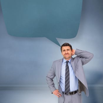 Thinking businessman against speech bubble