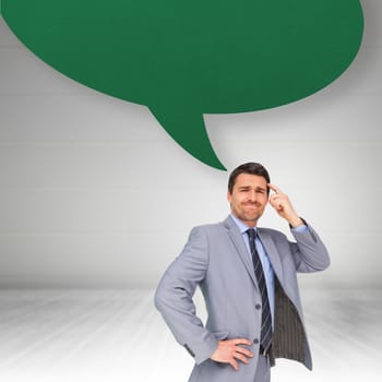 Thinking businessman against speech bubble