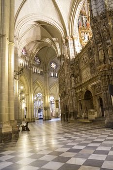 Interior of Toledo Cathedral. Arcs, organ, columns and gothic art. Spain