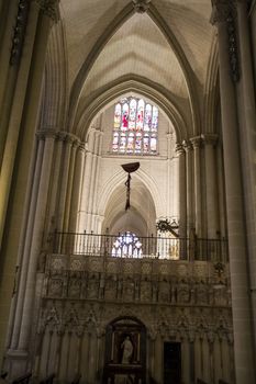 Interior of Toledo Cathedral. Arcs, organ, columns and gothic art. Spain