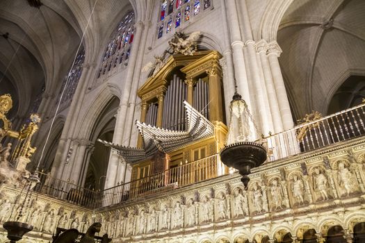 Interior of Toledo Cathedral. Arcs, organ, columns and gothic art. Spain