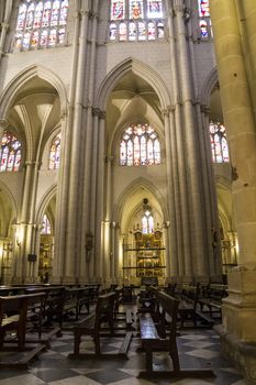 Interior of Toledo Cathedral. Arcs, organ, columns and gothic art. Spain