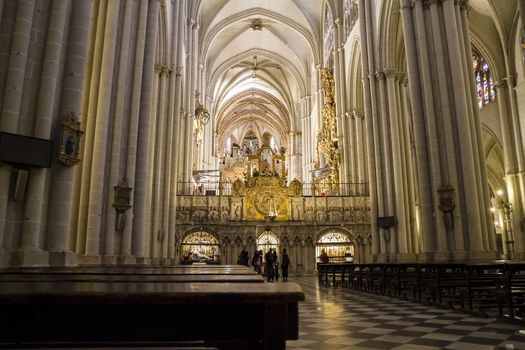 Interior of Toledo Cathedral. Arcs, organ, columns and gothic art. Spain