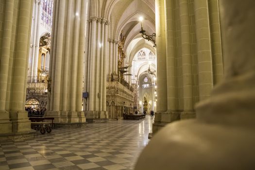 Interior of Toledo Cathedral. Arcs, organ, columns and gothic art. Spain