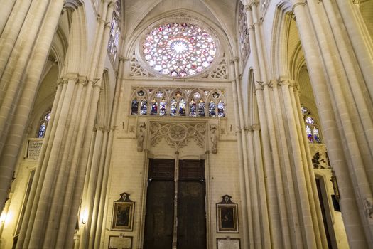 Interior of Toledo Cathedral. Arcs, organ, columns and gothic art. Spain