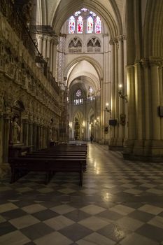 Interior of Toledo Cathedral. Arcs, organ, columns and gothic art. Spain