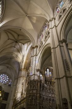 Interior of Toledo Cathedral. Arcs, organ, columns and gothic art. Spain