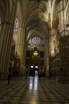 Interior of Toledo Cathedral. Arcs, organ, columns and gothic art. Spain