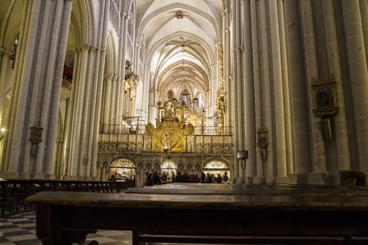 Interior of Toledo Cathedral. Arcs, organ, columns and gothic art. Spain