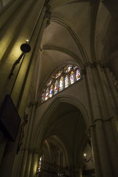 Interior of Toledo Cathedral. Arcs, organ, columns and gothic art. Spain