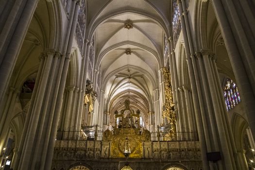 Interior of Toledo Cathedral. Arcs, organ, columns and gothic art. Spain