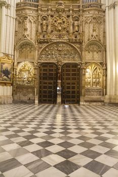 Interior of Toledo Cathedral. Arcs, organ, columns and gothic art. Spain