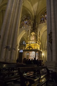 Interior of Toledo Cathedral. Arcs, organ, columns and gothic art. Spain