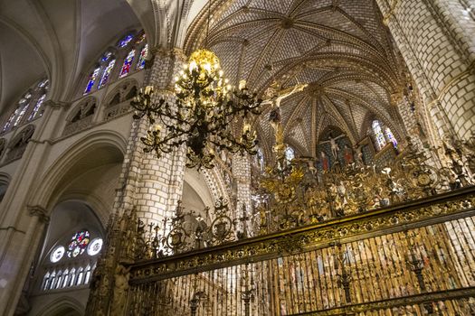 Interior of Toledo Cathedral. Arcs, organ, columns and gothic art. Spain