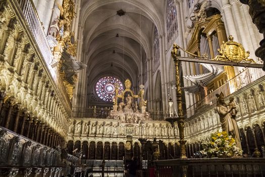 Interior of Toledo Cathedral. Arcs, organ, columns and gothic art. Spain