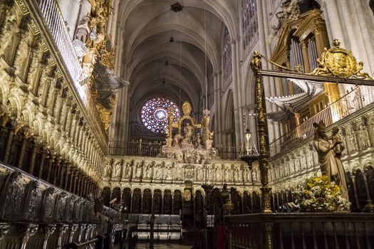 Interior of Toledo Cathedral. Arcs, organ, columns and gothic art. Spain