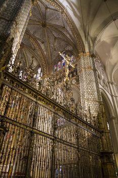 Interior of Toledo Cathedral. Arcs, organ, columns and gothic art. Spain