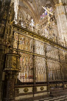 Interior of Toledo Cathedral. Arcs, organ, columns and gothic art. Spain