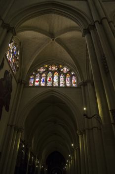 Interior of Toledo Cathedral. Arcs, organ, columns and gothic art. Spain