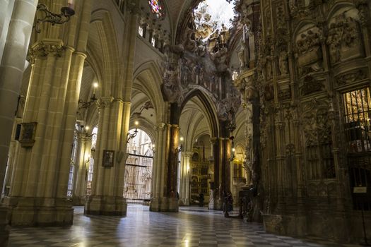 Interior of Toledo Cathedral. Arcs, organ, columns and gothic art. Spain