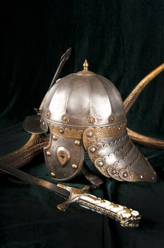 Iron helmet of the medieval knight. Very heavy headdress