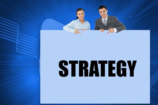 Business partners showing card saying strategy against digital background