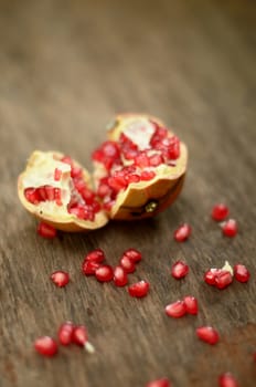 Pomegranate on wooden table