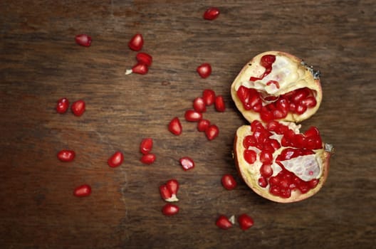 Pomegranate on wooden table