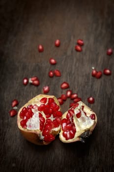 Pomegranate on wooden table