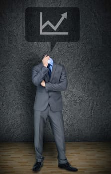 Composite image of headless businessman with graph in speech bubble in grey room