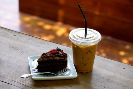 iced cappuccino and chocolate cake for afternoon break