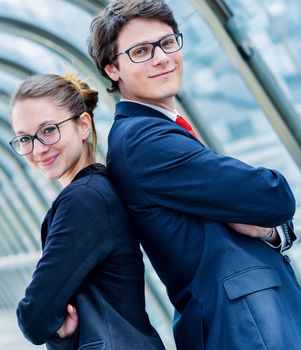 expressive portrait Junior executives of company crossed arms