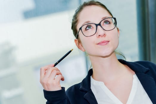 Outdoor portrait of a dynamic junior executive