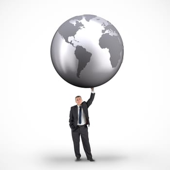 Composite image of businessman holding globe against white background with vignette