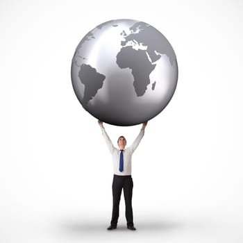 Composite image of businessman holding globe against white background with vignette