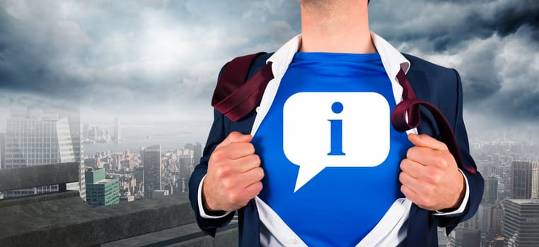 Businessman opening his shirt superhero style against balcony overlooking city