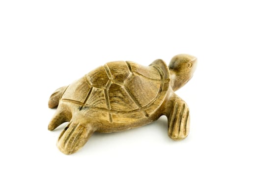 wooden turtle on a white background