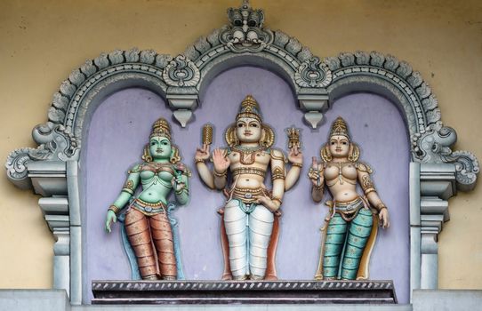 Lord Murugan and his two wives, Valli and Deivayanai at Rathinagiri Hill Temple in Vellore, Tamil Nadu, India.