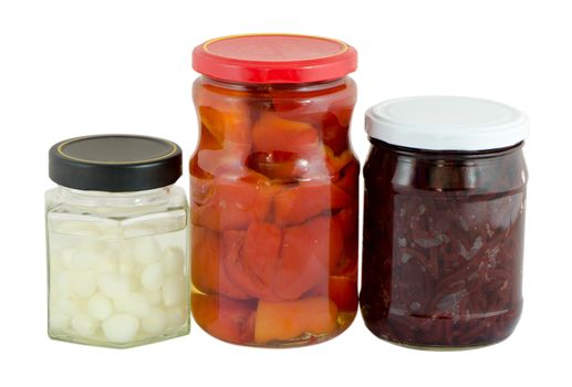 glass jar of pickled garlic red pepper and beetroot isolated on white background