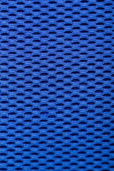 synthetic blue cloth. grid closeup. macro. photo
