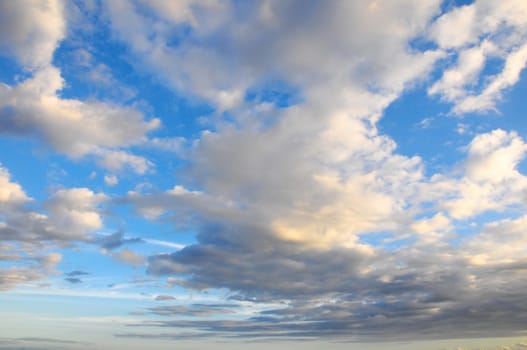 Cloudscape, Colored Clouds at Sunset near the Ocean