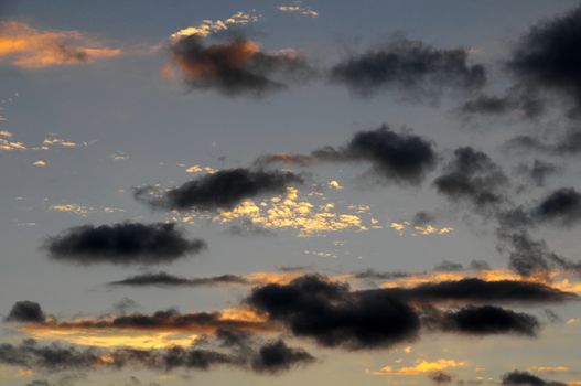 Cloudscape, Colored Clouds at Sunset near the Ocean