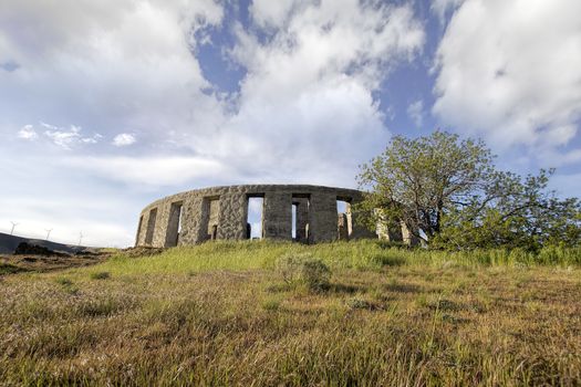 Stonehenge Replica Memorial at Maryhill Washington with White Clouds Blue Sky Scenic Landscape
