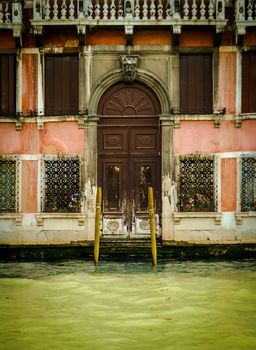 Retro Styled Detail Of A Rustic House On the Side Of The Grand Canal In Venice Italy