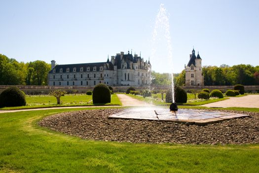 Chateau de Chenonceau backlighted from the garden