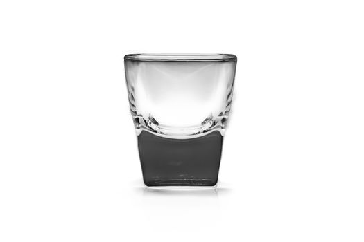 Empty shot glass on white background