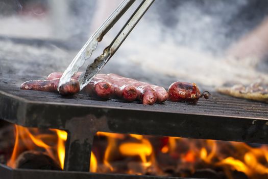 barbecue with sausages and lamb in a medieval fair, Spain