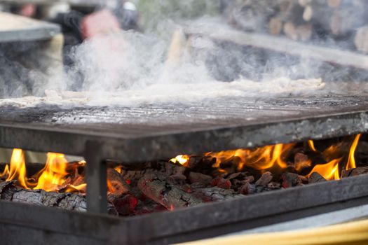 picnic, barbecue with sausages and lamb in a medieval fair, Spain