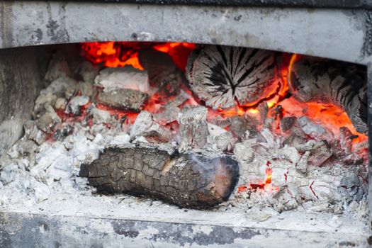 cooking, barbecue with sausages and lamb in a medieval fair, Spain